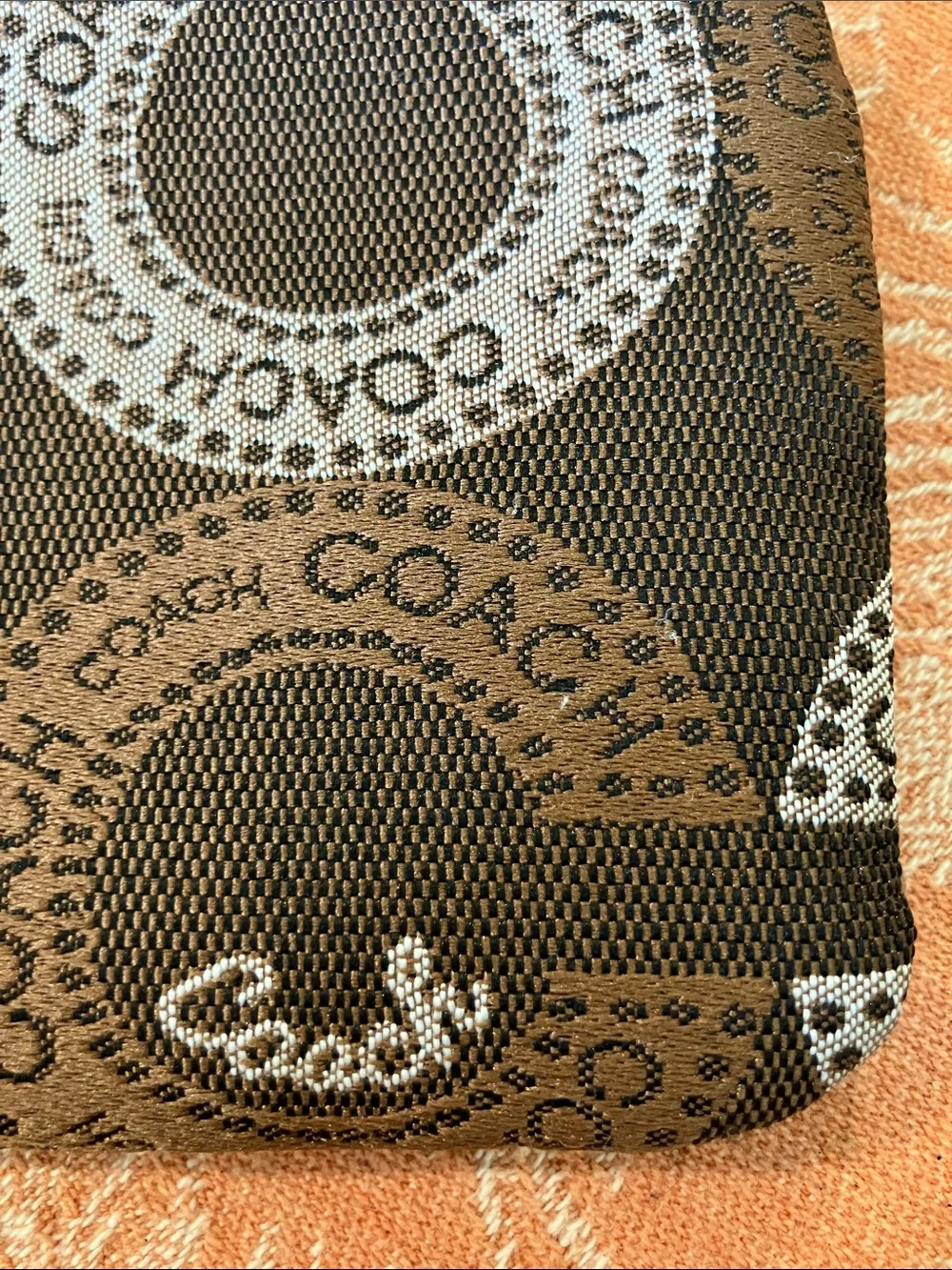Coach Brown and Black Signature Circle Zip Pouch